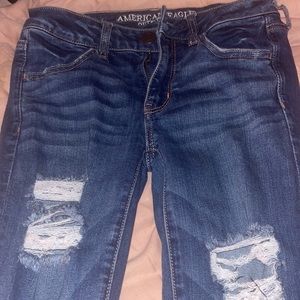 AMERICAN EAGLE RIPPED DARK WASH SKINNY JEAN (AMAZING CONDITION SIZE US 4)